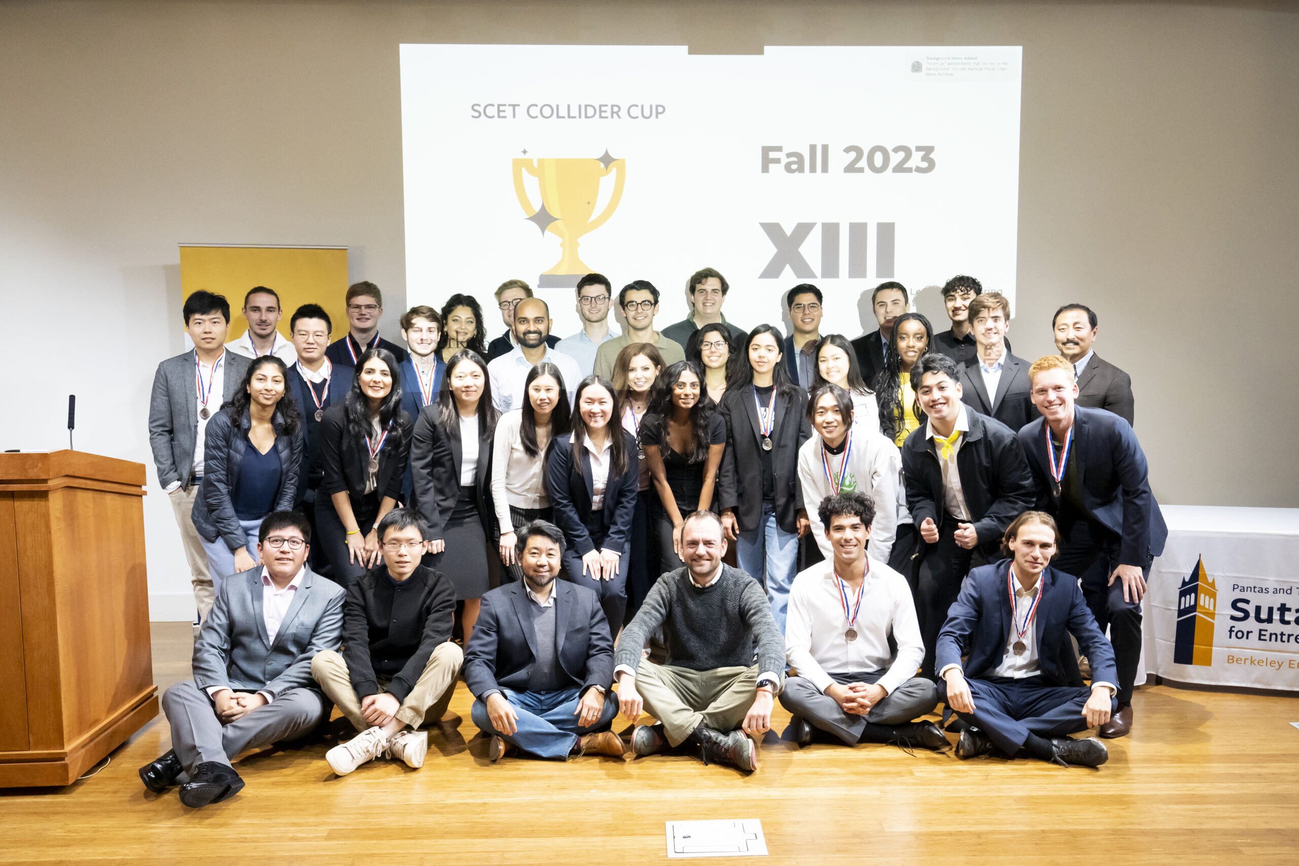 A group of SCET students, faculty, and guests smiling at Collider Cup XIII.
